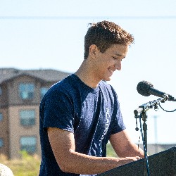 Joshua Loehr, a senior at Discovery Canyon Campus High School delivers his speech at the 2022 Back to School Rally 